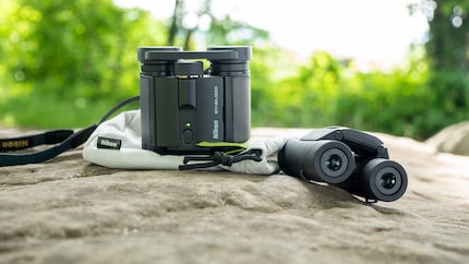 The Olympus model is even more compact. However, there are no batteries in it either.